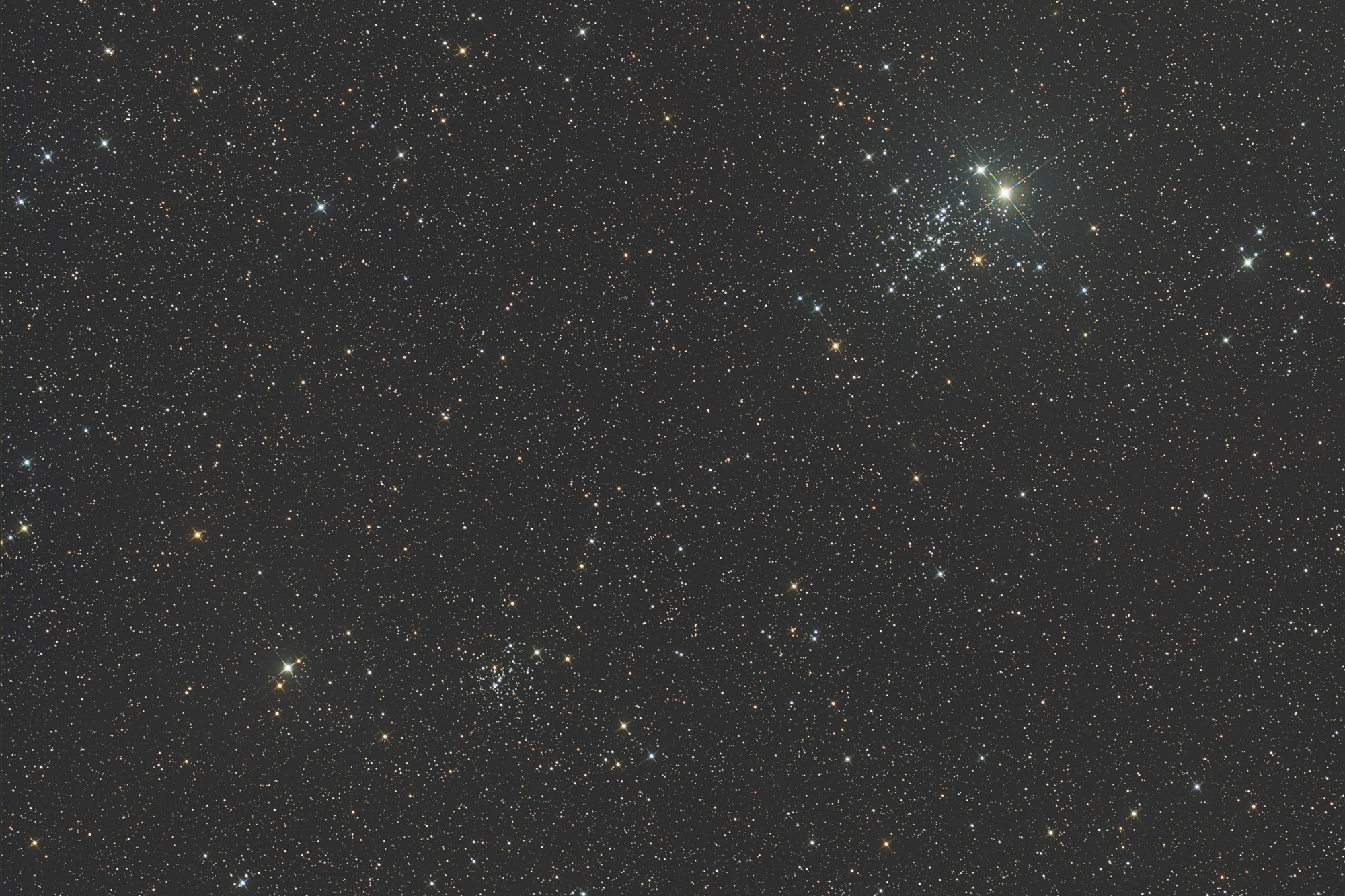 The Owl Cluster NGC 457 is the brightest open star cluster in Cassiopeia and one of the most beautiful objects of its kind in the northern sky. The open star cluster NGC 436 is below left in the image.